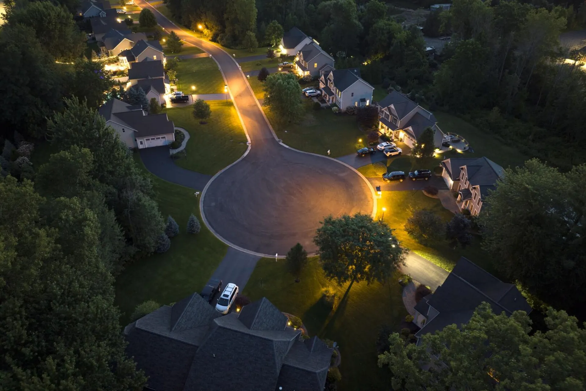 Aerial twilight view of residential neighborhood