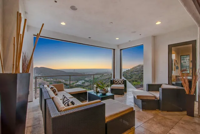 Property with vibrant sunset backdrop