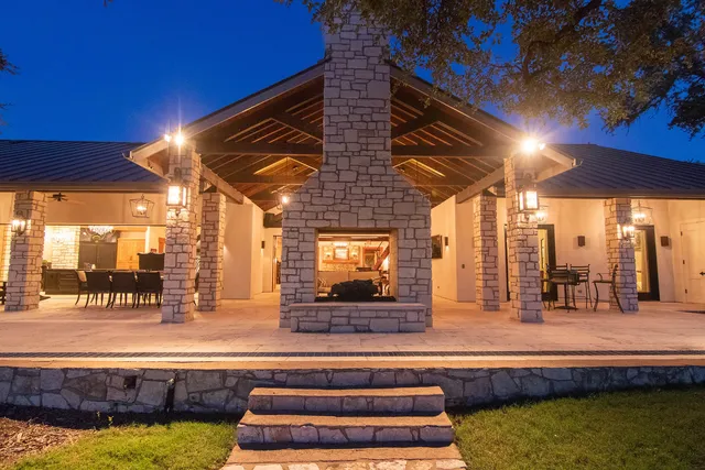 Property with dramatic dusk lighting