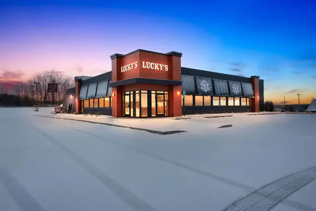Retail property at dusk in West Branch, MI